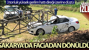 3 tonluk yüksek gerilim hattı direği, otomobilin üzerine devrildi