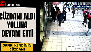 Cüzdanı aldı yoluna devam etti Sanki kendinin cüzdanı