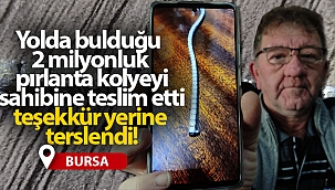 Yolda bulduğu 2 milyonluk pırlanta kolyeyi sahibine teslim etti