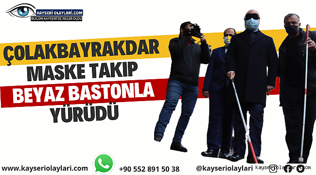 Çolakbayrakdar maske takıp beyaz bastonla yürüdü 