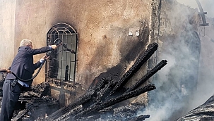 Yanmak üzere olan köpek itfaiye ekiplerince kurtarıldı